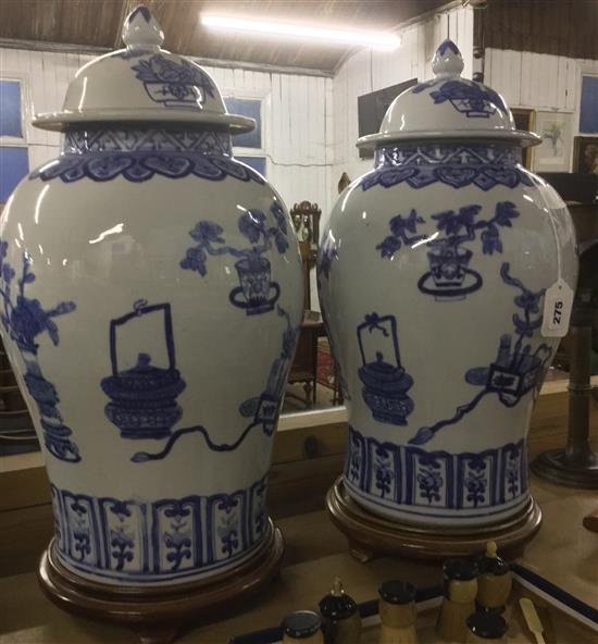 Pair of large Chinese blue and white baluster vases and covers